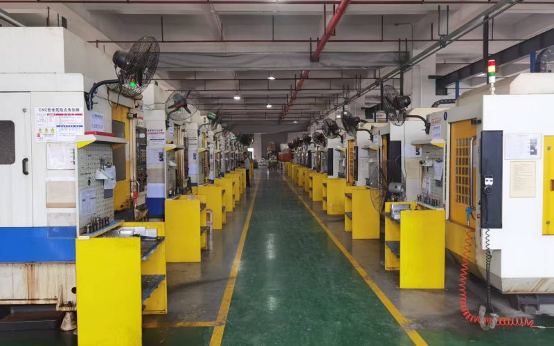 Factory floor in an Asian manufacturing facility, showcasing large-scale production and efficient layout.
